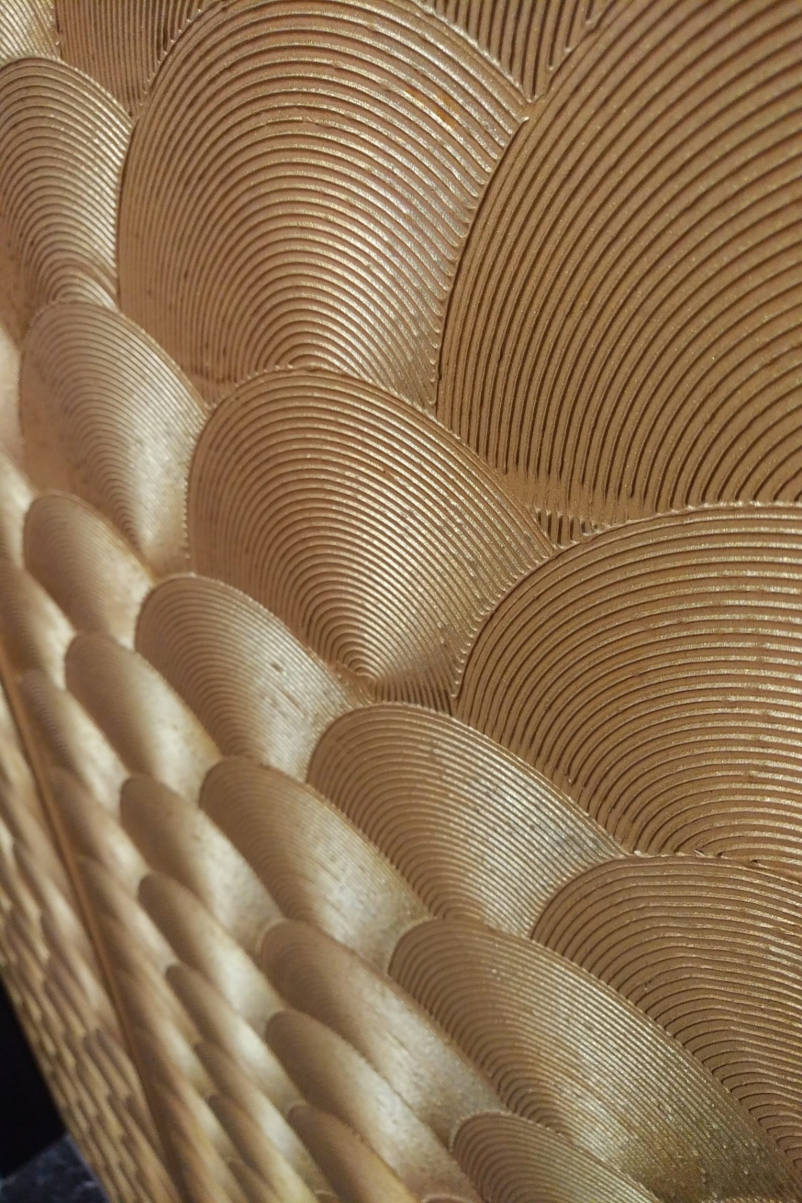 A gilded ribbed relief